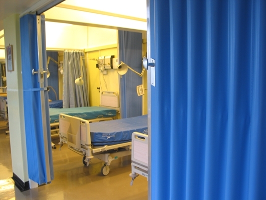 folding fabric room dividers in a hospital